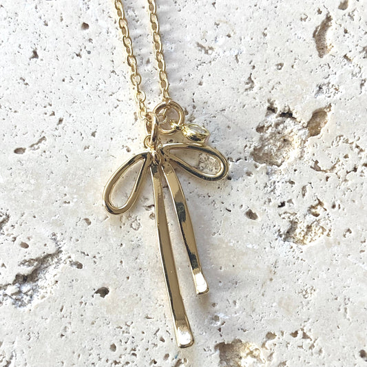 Necklace: Melted Droopy Ribbon Bow Charm Necklace