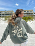 Load image into Gallery viewer, Hoodie: Jesus Holds It All
