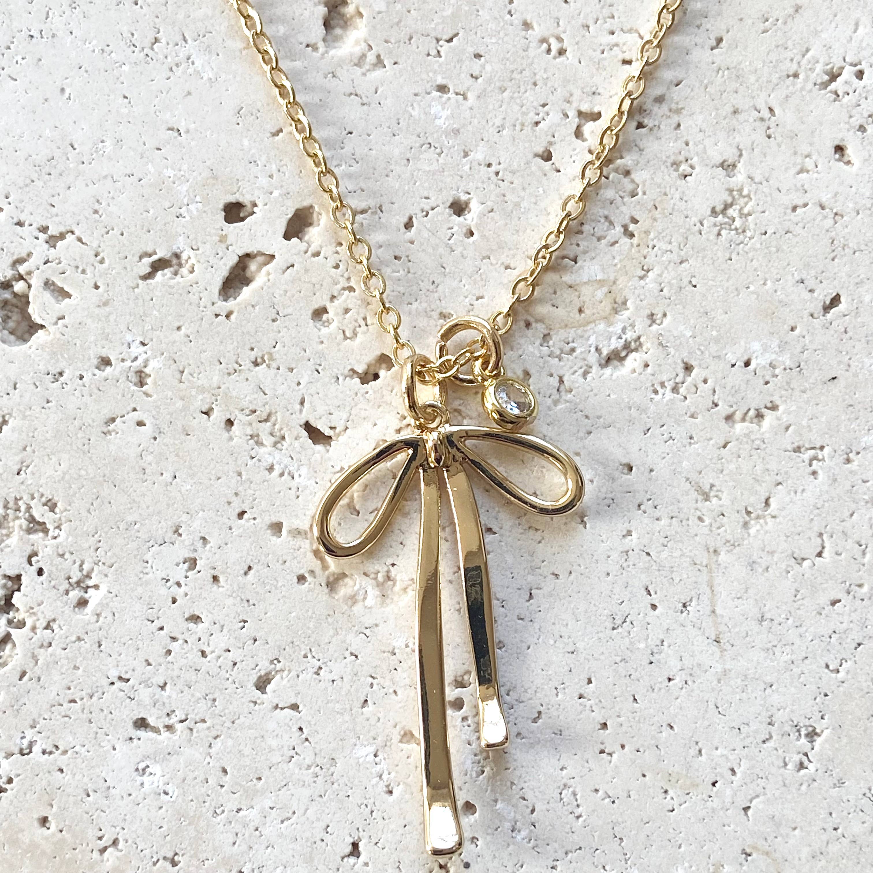 Droopy Ribbon Necklace: Melted Droopy Ribbon Bow Charm Necklace – HeyPeacock